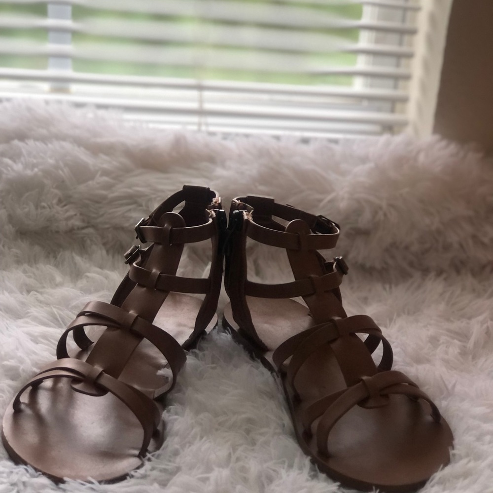 Girls gladiator sandals.